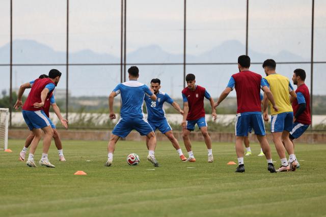 (FILES) Iran's players take part in a training session at their base camp in Antalya on May 19, 2026. Iran are moving their World Cup training base to Mexico after football's world governing body FIFA approved a request to transfer it from Tucson, Arizona, the head of Iran's football federation said on May 23. (Photo by Oner SAN / AFP)