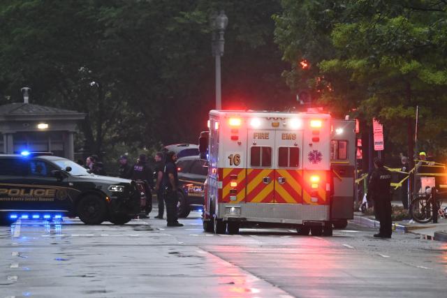 Emergency and police vehicles are seen near the White House in Washington, DC, on May 23, 2026. Police and security forces swarmed the area around the White House on the evening of May 23 after reports of shots fired, AFP journalists said. US President Donald Trump was at the White House at the time as he worked to negotiate a deal with Iran. (Photo by Alex WROBLEWSKI / AFP)