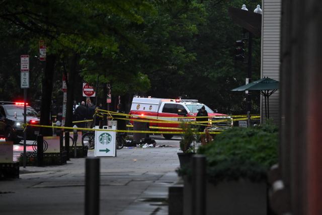 Police tape blocks off a sidewalk next to emergency and police vehicles near the White House in Washington, DC, on May 23, 2026. Police and security forces swarmed the area around the White House on the evening of May 23 after reports of shots fired, AFP journalists said. US President Donald Trump was at the White House at the time as he worked to negotiate a deal with Iran. (Photo by Alex WROBLEWSKI / AFP)