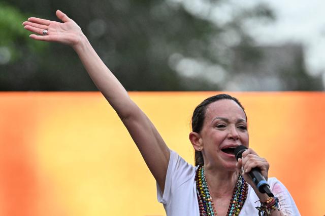 Venezuelan opposition leader Maria Corina Machado gestures as she speaks to venezuelan diaspora during a rally in Panama City on May 23, 2026. Machado is visiting Panama as part of a regional tour, during which she is set to meet with members of the Venezuelan diaspora and Panamanian President Jose Raul Mulino. (Photo by MARTIN BERNETTI / AFP)