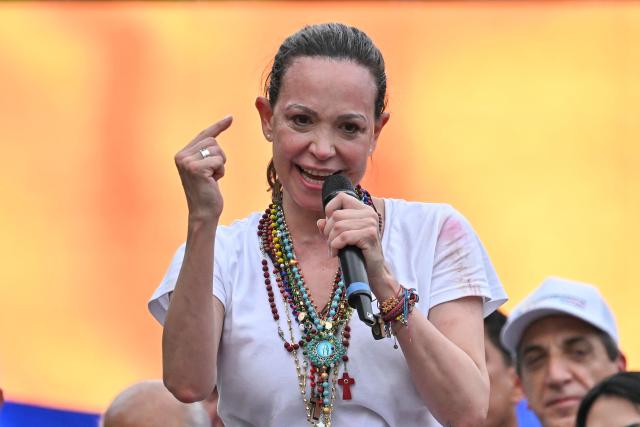 Venezuelan opposition leader Maria Corina Machado gestures as she speaks to venezuelan diaspora during a rally in Panama City on May 23, 2026. Machado is visiting Panama as part of a regional tour, during which she is set to meet with members of the Venezuelan diaspora and Panamanian President Jose Raul Mulino. (Photo by MARTIN BERNETTI / AFP)