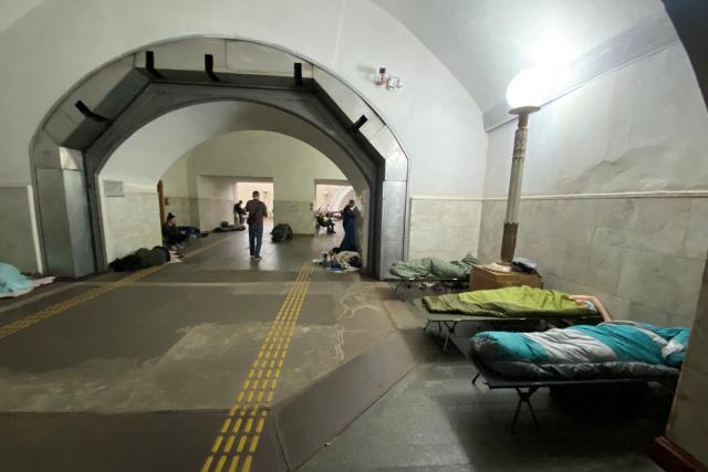 Residents take shelter in a metro station in central Kyiv during a Russian air attack on the Ukrainian capital early on May 24, 2026. A "mass ballistic missile attack" pounded Kyiv early on May 24, military authorities said, with AFP journalists hearing heavy explosions, after Ukraine warned it was expecting a major Russian assault. (Photo by Ania TSOUKANOVA / AFP)