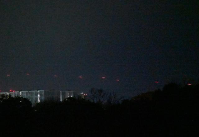 This photo shows Ukrainian air defence firing at Russian drones above Kyiv during a Russian drone and missile strike on the Ukrainian capital on May 24, 2026, amid the Russian invasion in Ukraine. A large ballistic missile attack pounded Kyiv early on May 24, authorities said, wounding at least five people after Moscow threatened retaliation for strikes in Russian-occupied eastern Ukraine. (Photo by Sergei SUPINSKY / AFP)