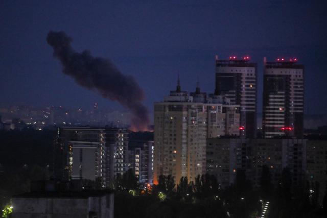 Smoke rises during a Russian strike on the Ukrainian capital Kyiv on May 24, 2026, amid the Russian invasion in Ukraine. A large ballistic missile attack pounded Kyiv early on May 24, authorities said, wounding at least five people after Moscow threatened retaliation for strikes in Russian-occupied eastern Ukraine. (Photo by Evgen KOTENKO / AFP)