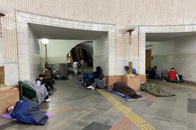 Residents take shelter in a metro station in central Kyiv during a Russian air attack on the Ukrainian capital early on May 24, 2026. A large ballistic missile attack pounded Kyiv early on May 24, authorities said, wounding at least five people after Moscow threatened retaliation for strikes in Russian-occupied eastern Ukraine. (Photo by Ania TSOUKANOVA / AFP)