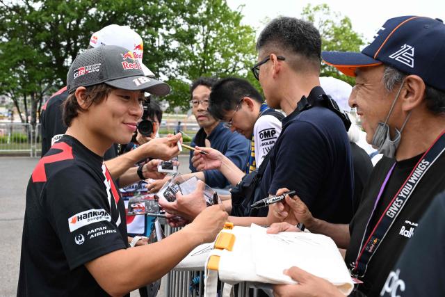 Toyota Gazoo Racing WRT team's Takamoto Katsuta of Japan meets fans during an autograph-signing session of the Rally Japan, the 7th round of the FIA World Rally Championships in Toyota city, Aichi prefecture on May 28, 2026. (Photo by Toshifumi KITAMURA / AFP)