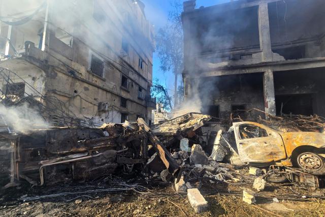 Destroyed vehicles are pictured at the site of an Israeli strike in Tyre, southern Lebanon, on May 28, 2026. The Israeli military said on May 28 it had begun new strikes on Hezbollah infrastructure around the southern Lebanese city of Tyre after issuing an evacuation warning to its residents. (Photo by KAWNAT HAJU / AFP)