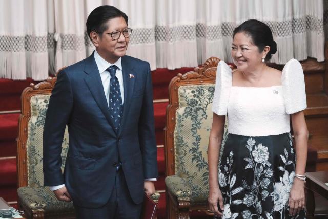 Philippines' President Ferdinand Marcos Jr. (L) and First Lady Liza Araneta-Marcos are welcomed by Japanese parliamentarians at the National Diet in Tokyo on May 28, 2026. (Photo by Kazuhiro NOGI / AFP)