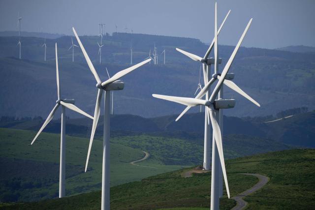 Wind turbines are pictured in the hills of the Coruxeiras wind farm, in Muras, some 130 km from Santiago de Compostela , northwestern Spain, on May 26, 2026. (Photo by MIGUEL RIOPA / AFP)