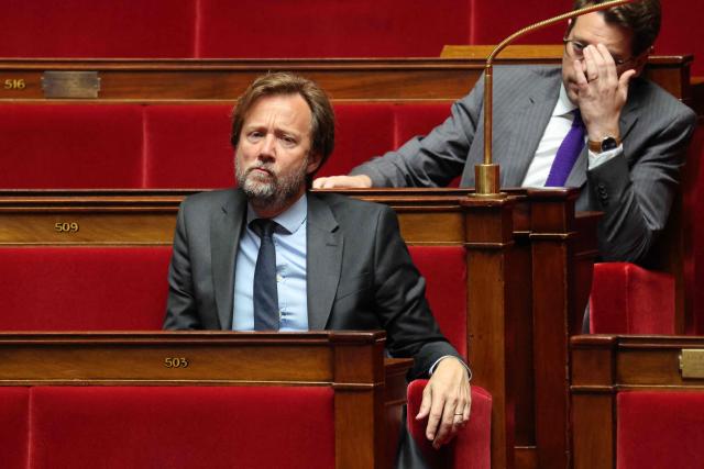 President of Socialistes et Apparentes parliamentary group Boris Vallaud (C) reacts during a session to debate a proposed bill aimed at abolishing the slavery-related laws at The National Assembly, France's lower house parliament, in Paris on May 28, 2026. These laws, known as Code Noir ("Black Code") classified enslaved people as "chattels" that could be acquired by a master in the same way as property, or established penalties for escapeincluding the cutting off of ears, branding with a lily, and even the death penalty. (Photo by Ludovic MARIN / AFP)