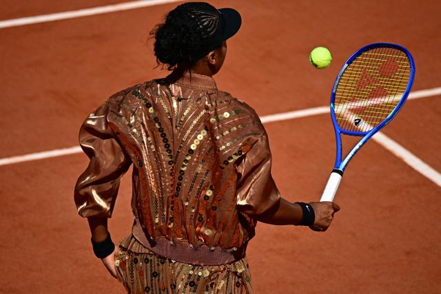 Japan's Naomi Osaka warms up prior to her women's singles match against Croatia's Donna Vekic on day 5 of the French Open tennis tournament on Court Simonne-Mathieu at the Roland-Garros Complex in Paris on May 28, 2026. (Photo by JULIEN DE ROSA / AFP)