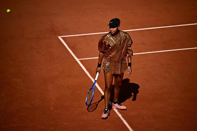 Japan's Naomi Osaka warms up prior to her women's singles match against Croatia's Donna Vekic on day 5 of the French Open tennis tournament on Court Simonne-Mathieu at the Roland-Garros Complex in Paris on May 28, 2026. (Photo by JULIEN DE ROSA / AFP)