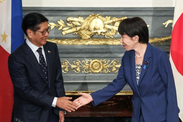 Japan's Prime Minister Sanae Takaichi (R) shakes hands with Philippines' President Ferdinand Marcos Jr. (L) before a meeting at the Akasaka Palace State Guest House in Tokyo on May 28, 2026. (Photo by Kiyoshi Ota / POOL / AFP)