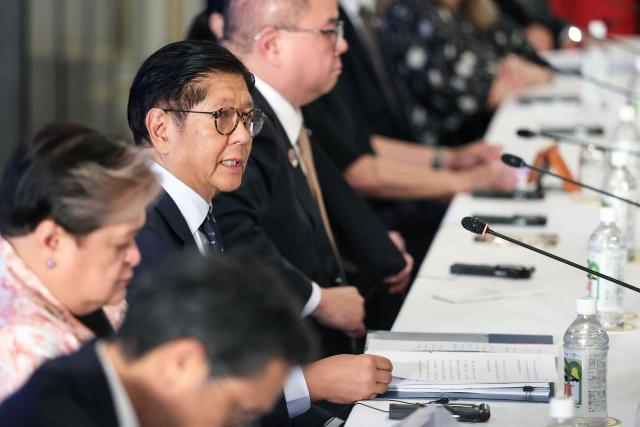 Philippines' President Ferdinand Marcos Jr. sits with his delegation during a meeting with Japan's Prime Minister Sanae Takaichi at the Akasaka Palace State Guest House in Tokyo on May 28, 2026. (Photo by Kiyoshi Ota / POOL / AFP)