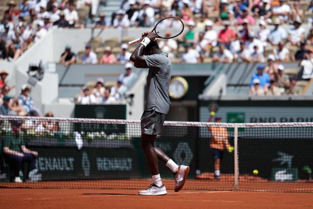 France's Moise Kouame reacts as he plays against Paraguay's Adolfo Daniel Vallejo during their men's singles match on day 5 of the French Open tennis tournament on Court Suzanne-Lenglen at the Roland-Garros Complex in Paris on May 28, 2026. (Photo by Dimitar DILKOFF / AFP)