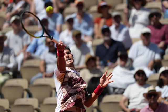 Paraguay's Adolfo Daniel Vallejo plays a forehand return to France's Moise Kouame during their men's singles match on day 5 of the French Open tennis tournament on Court Suzanne-Lenglen at the Roland-Garros Complex in Paris on May 28, 2026. (Photo by Dimitar DILKOFF / AFP)