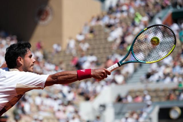 Paraguay's Adolfo Daniel Vallejo plays a forehand return to France's Moise Kouame during their men's singles match on day 5 of the French Open tennis tournament on Court Suzanne-Lenglen at the Roland-Garros Complex in Paris on May 28, 2026. (Photo by Dimitar DILKOFF / AFP)