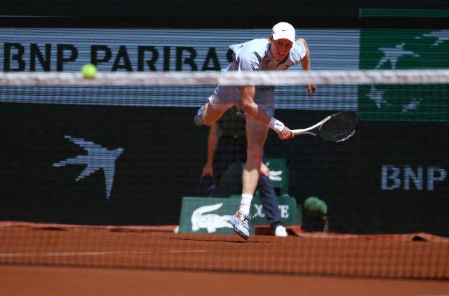 Italy's Jannik Sinner serves to Argentina's Juan Manuel Cerundolo during their men's singles match on day 5 of the French Open tennis tournament on Court Philippe-Chatrier at the Roland-Garros Complex in Paris on May 28, 2026. (Photo by Alain JOCARD / AFP)