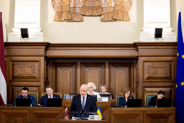 Andris Kulbergs, candidate for Prime Minister, speaks during a parliamentary session before voting for the approval of the new cabinet of government ministers in the Saeima (Parliament of Latvia) on May 28, 2026 in Riga, Latvia. (Photo by Gints Ivuskans and AFP / AFP)