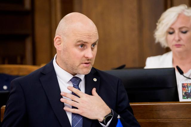 Andris Kulbergs, candidate for Prime Minister, speaks during a parliamentary session before voting for the approval of the new cabinet of government ministers in the Saeima (Parliament of Latvia) on May 28, 2026 in Riga, Latvia. (Photo by Gints Ivuskans and AFP / AFP)