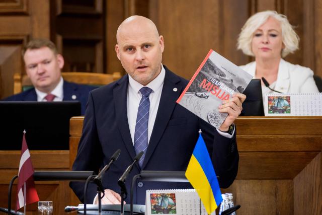 Andris Kulbergs, candidate for Prime Minister, speaks during a parliamentary session before voting for the approval of the new cabinet of government ministers in the Saeima (Parliament of Latvia) on May 28, 2026 in Riga, Latvia. (Photo by Gints Ivuskans / AFP)
