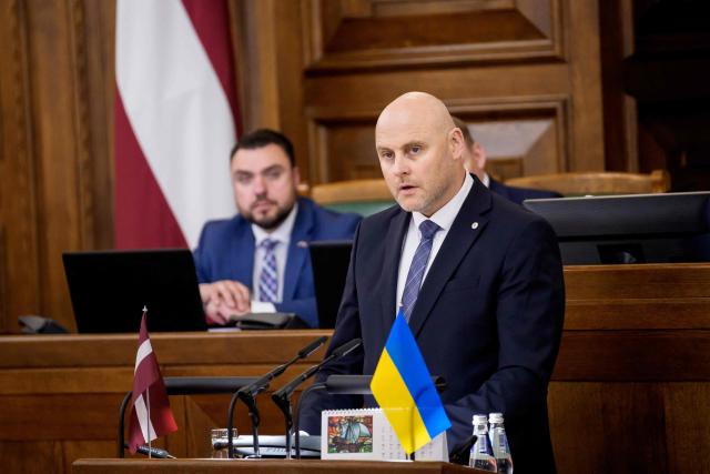 Andris Kulbergs, candidate for Prime Minister, speaks during a parliamentary session before voting for the approval of the new cabinet of government ministers in the Saeima (Parliament of Latvia) on May 28, 2026 in Riga, Latvia. (Photo by Gints Ivuskans / AFP)