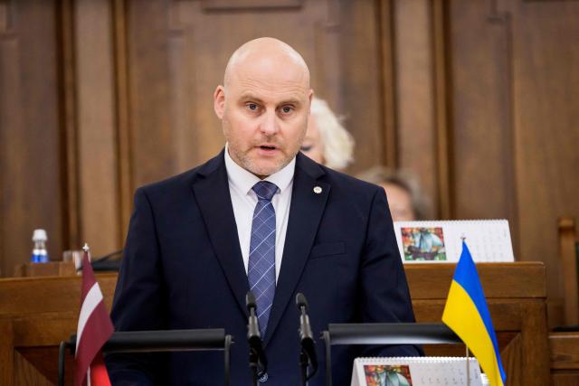 Andris Kulbergs, candidate for Prime Minister, speaks during a parliamentary session before voting for the approval of the new cabinet of government ministers in the Saeima (Parliament of Latvia) on May 28, 2026 in Riga, Latvia. (Photo by Gints Ivuskans / AFP)