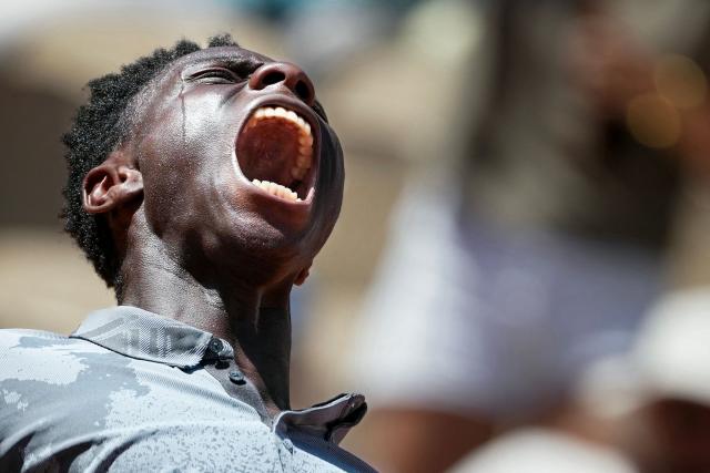 France's Moise Kouame reacts as he wins the second set playing against Paraguay's Adolfo Daniel Vallejo during their men's singles match on day 5 of the French Open tennis tournament on Court Suzanne-Lenglen at the Roland-Garros Complex in Paris on May 28, 2026. (Photo by Dimitar DILKOFF / AFP)