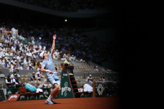Italy's Jannik Sinner serves to Argentina's Juan Manuel Cerundolo during their men's singles match on day 5 of the French Open tennis tournament on Court Philippe-Chatrier at the Roland-Garros Complex in Paris on May 28, 2026. (Photo by ALAIN JOCARD / AFP)
