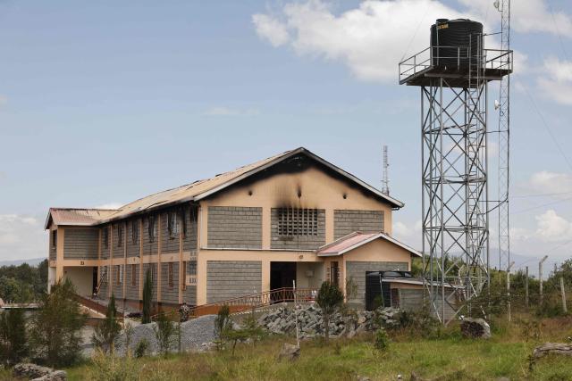 A general view of the building at Utumishi Girls Academy where a deadly fire took place in Gilgil, north of the capital Nairobi on May 28, 2026. A fire in a girls' dormitory in Kenya on May 28 killed 16 children and hospitalised 79 in the latest deadly blaze to hit a school in the east African country. The fire broke out shortly before 1:00 am local time at Utumishi Girls Academy in Nakuru County, around 120 kilometres (75 miles) north of the capital Nairobi, officials said. (Photo by SIMON MAINA / AFP)