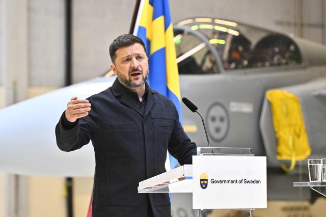 Ukraine's President Volodymyr Zelensky addresses a press conference at the F16 air flotilla in Uppsala, Sweden on May 28, 2026. (Photo by Christine Olsson/TT / various sources / AFP) / Sweden OUT