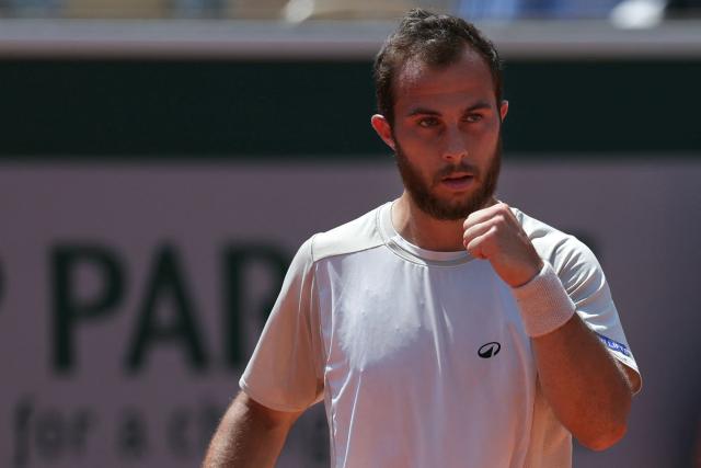 France's Hugo Gaston reacts to a point against Argentina's Francisco Cerundolo during their men's singles match on day 5 of the French Open tennis tournament on Court Simonne-Mathieu at the Roland-Garros Complex in Paris on May 28, 2026. (Photo by Thomas SAMSON / AFP)