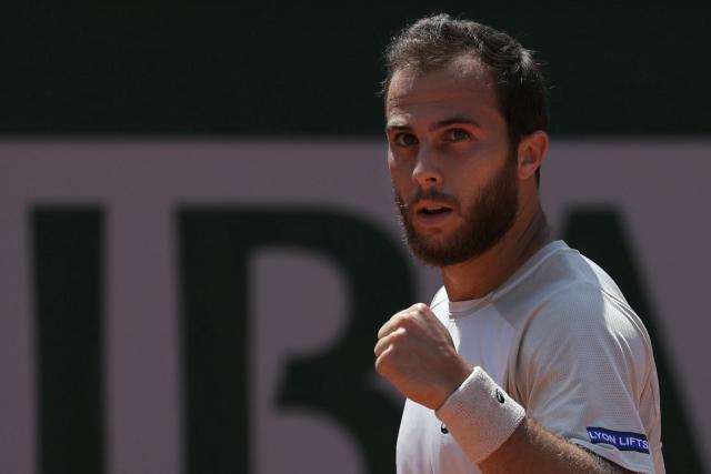 France's Hugo Gaston reacts to a point against Argentina's Francisco Cerundolo during their men's singles match on day 5 of the French Open tennis tournament on Court Simonne-Mathieu at the Roland-Garros Complex in Paris on May 28, 2026. (Photo by Thomas SAMSON / AFP)
