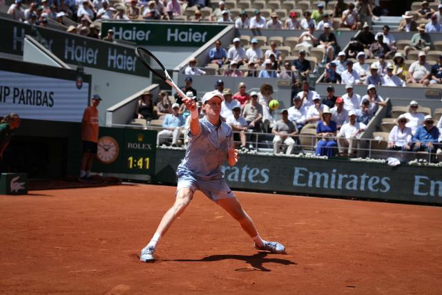 Italy's Jannik Sinner plays a forehand return to Argentina's Juan Manuel Cerundolo during their men's singles match on day 5 of the French Open tennis tournament on Court Philippe-Chatrier at the Roland-Garros Complex in Paris on May 28, 2026. (Photo by ALAIN JOCARD / AFP)