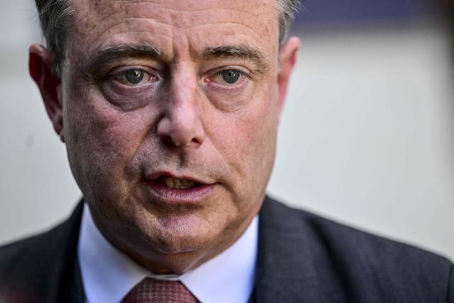 Belgium 's Prime Minister Bart De Wever speaks to the press after attending the official opening of the new production line dedicated to the F-35 program at the aerospace company Sonaca's site in Gosselies on May 28, 2026. (Photo by DIRK WAEM / Belga / AFP) / Belgium OUT