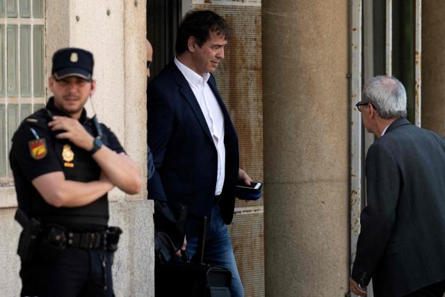 David Sanchez (C), the brother of Spain's Prime Minister Pedro Sanchez leaves the Provincial Court of Badajoz, in Badajoz on May 28, 2026. David Sanchez went on trial on allegations of receiving favorable treatment to secure a tailor-made job which was later converted into head of the province’s Performing Arts Office, in Badajoz. He is charged along with 10 others for alleged crimes of administrative malfeasance and influence peddling. (Photo by JORGE GUERRERO / EFE pool / AFP)