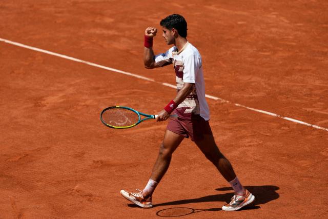 Paraguay's Adolfo Daniel Vallejo reacts after a point as he plays against France's Moise Kouame during their men's singles match on day 5 of the French Open tennis tournament on Court Suzanne-Lenglen at the Roland-Garros Complex in Paris on May 28, 2026. (Photo by Dimitar DILKOFF / AFP)