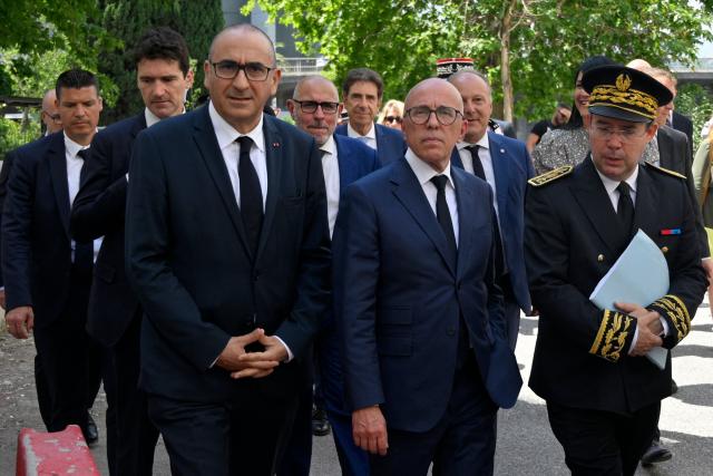 (From L) France's Interior Minister Laurent Nunez, Mayor of Nice Eric Ciotti and Prefect of the Alpes-Maritimes department Laurent Hottiaux walk in the Les Moulins neighbourhood in Nice, south-eastern France on May 28, 2026. (Photo by Frederic DIDES / AFP)