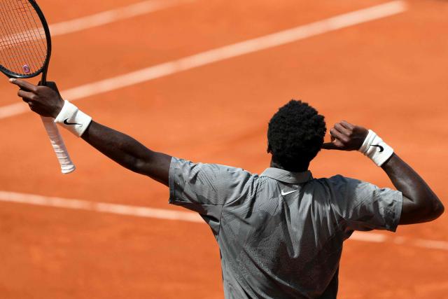 France's Moise Kouame reacts after winning a game as he plays against Paraguay's Adolfo Daniel Vallejo during their men's singles match on day 5 of the French Open tennis tournament on Court Suzanne-Lenglen at the Roland-Garros Complex in Paris on May 28, 2026. (Photo by Dimitar DILKOFF / AFP)