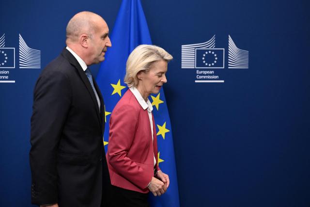 European Commission President Ursula von der Leyen (R) and Bulgaria's Prime Minister Rumen Radev (L) leave after posing for photographs prior to a meeting at the EU headquarters in Brussels on May 28, 2026. (Photo by Nicolas TUCAT / AFP)