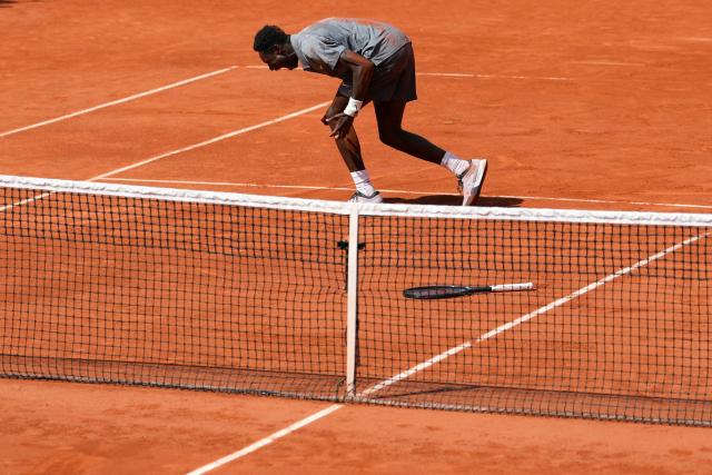 France's Moise Kouame celebrates after winning against Paraguay's Adolfo Daniel Vallejo during their men's singles match on day 5 of the French Open tennis tournament on Court Suzanne-Lenglen at the Roland-Garros Complex in Paris on May 28, 2026. (Photo by Dimitar DILKOFF / AFP)