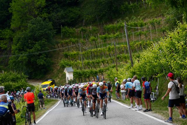 Riders climb near Valdobbiadene during the 18th stage of the Giro d'Italia 2026 - Tour of Italy cycling race between Fai della Paganella and Pieve di Soligo, Italy, on May 28, 2026. (Photo by Luca Bettini / AFP)