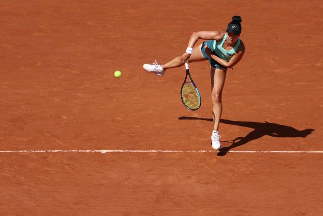 US Ann Li serves to France's Diane Parry during their women's singles match on day 5 of the French Open tennis tournament on Court Philippe-Chatrier at the Roland-Garros Complex in Paris on May 28, 2026. (Photo by ALAIN JOCARD / AFP)