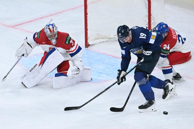 Finland's forward #19 Waltteri Merela controls the puck during the IIHF Ice Hockey Men's World Championship quarter-final match between Finland and Czech Republic at the Swiss Life Arena in Zurich, Switzerland on May 28, 2026. (Photo by SEBASTIEN BOZON / AFP)