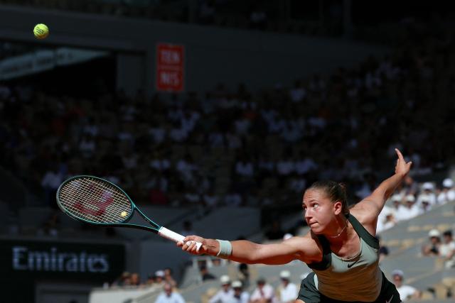 France's Diane Parry stretches to play a backhand return to US Ann Li during their women's singles match on day 5 of the French Open tennis tournament on Court Philippe-Chatrier at the Roland-Garros Complex in Paris on May 28, 2026. (Photo by ALAIN JOCARD / AFP)