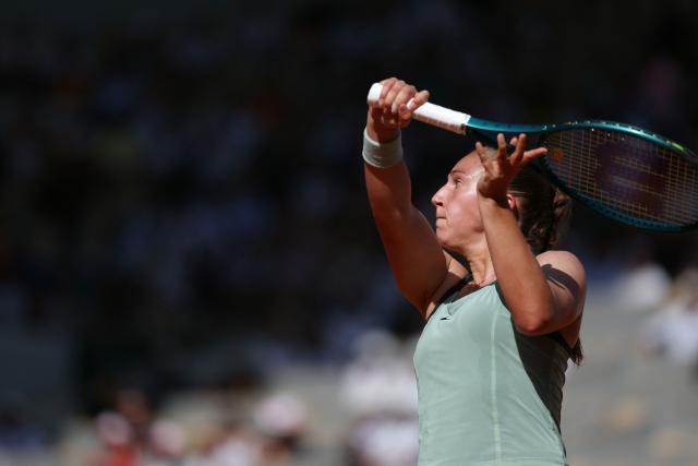 France's Diane Parry plays a backhand return to US Ann Li during their women's singles match on day 5 of the French Open tennis tournament on Court Philippe-Chatrier at the Roland-Garros Complex in Paris on May 28, 2026. (Photo by Alain JOCARD / AFP)