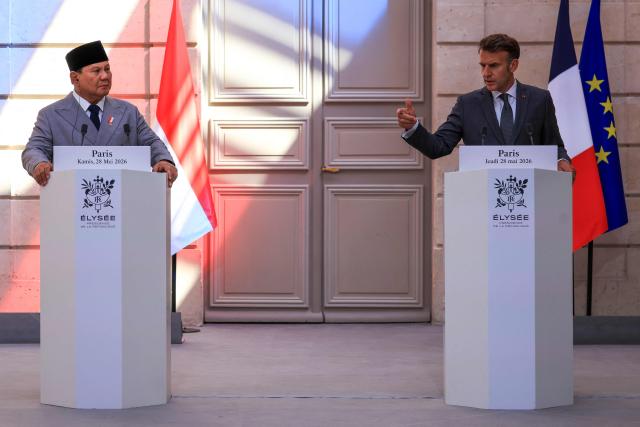 France's President Emmanuel Macron (R) and Indonesia's President Prabowo Subianto attend a joint press statement at The Elysee Presidential Palace in Paris on May 28, 2026. (Photo by Ludovic MARIN / POOL / AFP)