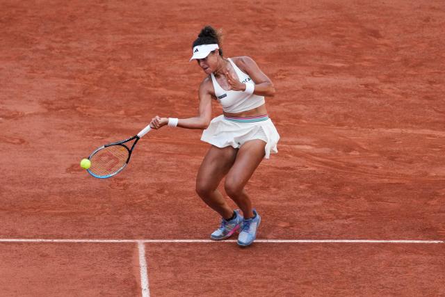 Egypt's Mayar Sherif plays a forehand return to US Coco Gauff during their women's singles match on day 5 of the French Open tennis tournament on Court Suzanne-Lenglen at the Roland-Garros Complex in Paris on May 28, 2026. (Photo by Dimitar DILKOFF / AFP)