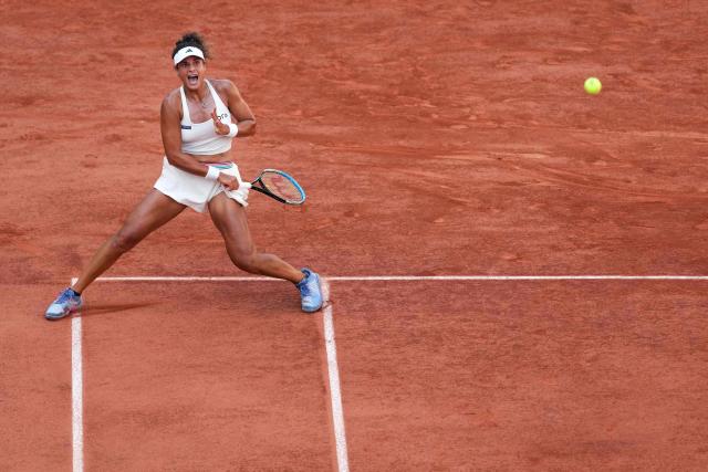 Egypt's Mayar Sherif plays a forehand return to US Coco Gauff during their women's singles match on day 5 of the French Open tennis tournament on Court Suzanne-Lenglen at the Roland-Garros Complex in Paris on May 28, 2026. (Photo by Dimitar DILKOFF / AFP)