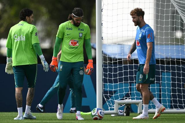 (L to R) Brazil's goalkeeper Ederson Moraes, goalkeeper Alisson and defender Leo Pereira take part in a training session at the Granja Comary training center in Teresopolis, Rio de Janeiro, Brazil, on May 28, 2026, ahead of the FIFA World Cup 2026. (Photo by MAURO PIMENTEL / AFP)